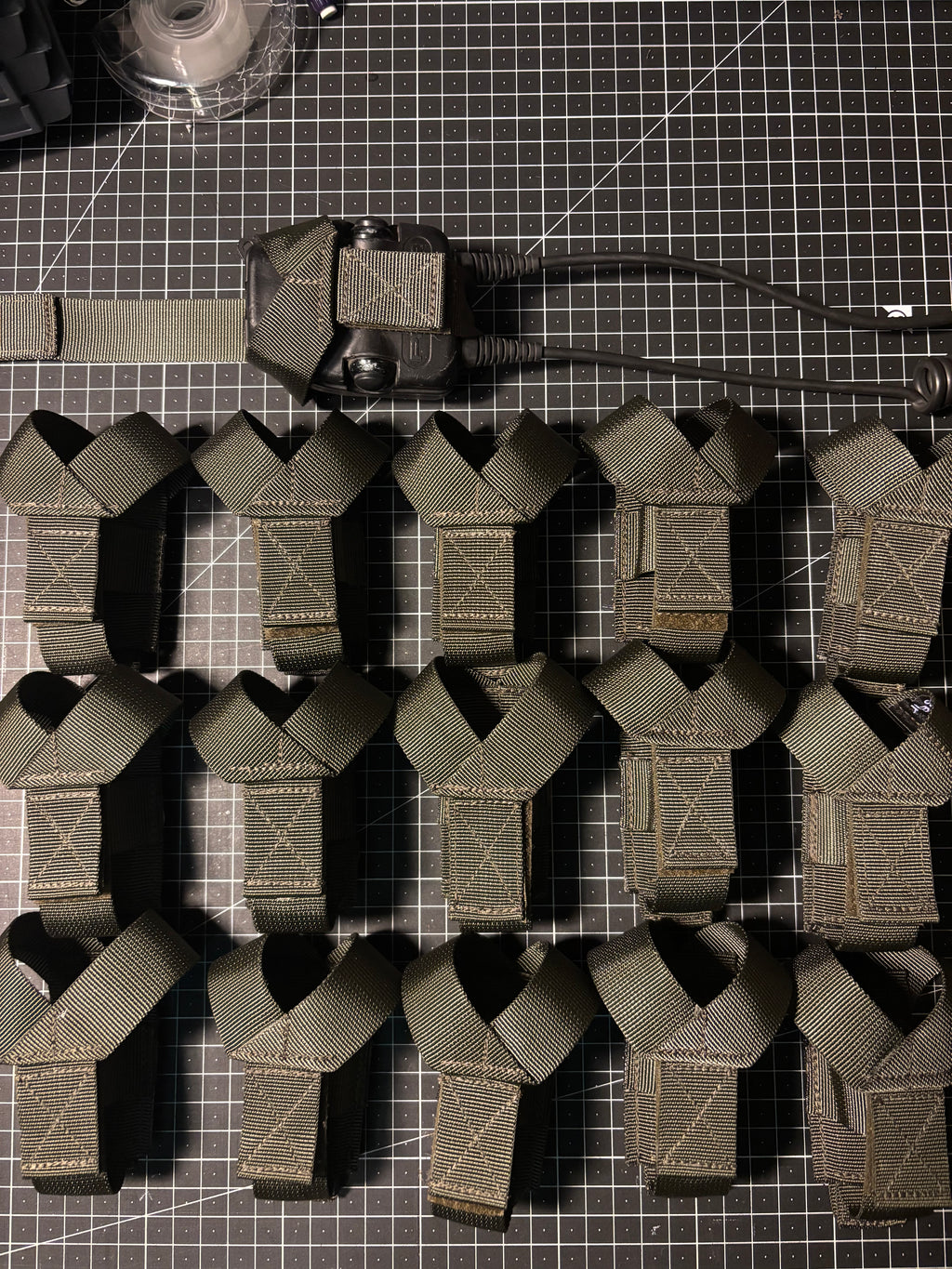 Molle retainer for 3M Peltor dual PTT