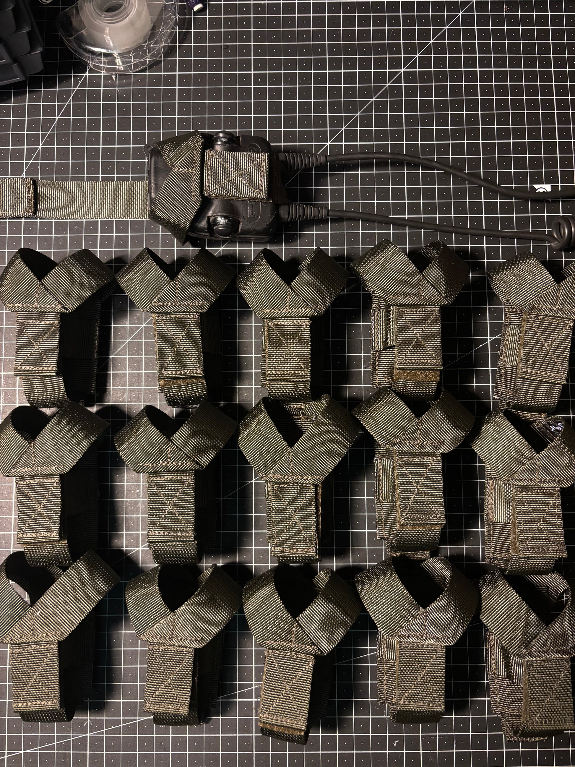 Molle retainer for 3M Peltor dual PTT